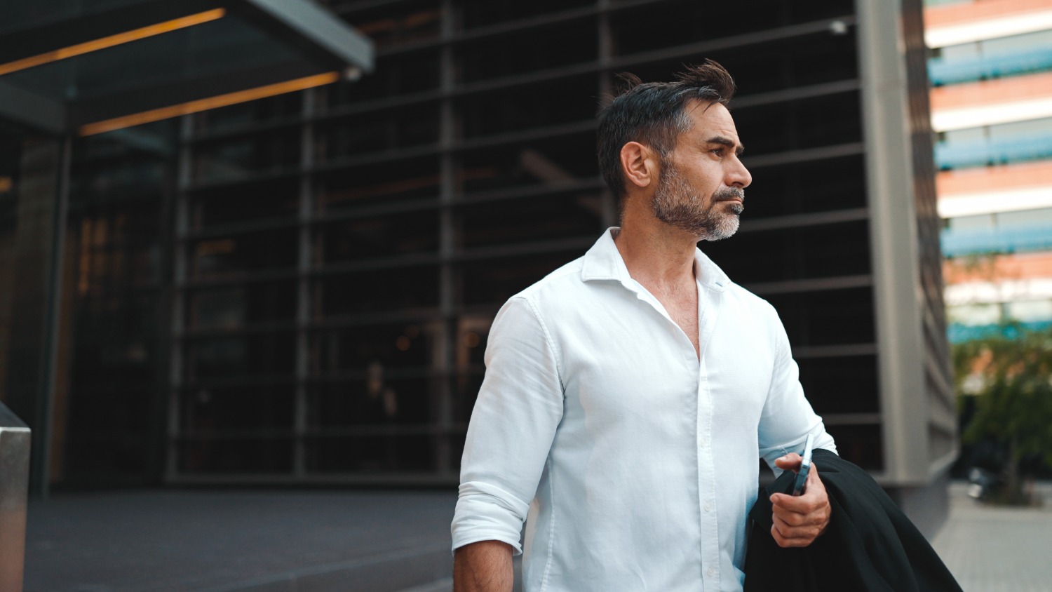 Mature Businessman looking off to the right
